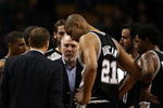 BOSTON - FEBRUARY 08:  Head coach Gregg Popovich of the San Antonio Spurs talks with his players during a time out against the Boston Celtics on February 8, 2009 at TD Banknorth Garden in Boston, Massachusetts. The Spurs defeated the Celtics 105-99. NOTE TO USER: User expressly acknowledges and agrees that, by downloading and or using this Photograph, user is consenting to the terms and conditions of the Getty Images License Agreement.  (Photo by Elsa/Getty Images)