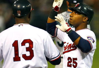 MINNEAPOLIS, MN - APRIL 6:  Alexi Casilla #25 of the Minnesota Twins reacts after singling in the first inning against the Seattle Mariners on Opening Day at the Metrodome on April 6, 2009 in Minneapolis, Minnesota. (Photo by Scott A. Schneider/Getty Images)