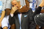 DETROIT - APRIL 06:  Deon Thompson #21 and head coach Roy Williams of the North Carolina Tar Heels celebrates after defeating the Michigan State Spartans 89-72 during the 2009 NCAA Division I Men's Basketball National Championship game at Ford Field on April 6, 2009 in Detroit, Michigan.  (Photo by Streeter Lecka/Getty Images)