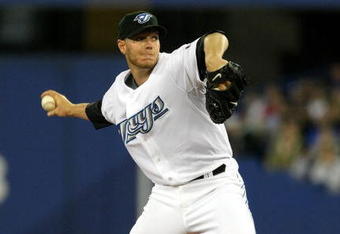 TORONTO - APRIL 6:  Roy Halladay #32 of the Toronto Blue Jays throws a pitch against the Detroit Tigers during their MLB game at the Rogers Centre April 6, 2009 in Toronto, Ontario.(Photo By Dave Sandford/Getty Images)