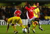 VILLARREAL, SPAIN - APRIL 07:  Emmanuel Adebayor of Arsenal has an attempt on goal during the UEFA Champions League quarter-final first leg match between Villarreal and Arsenal at the Madrigal Stadium on April 7, 2009 in Villarreal, Spain.  (Photo by Jamie McDonald/Getty Images)