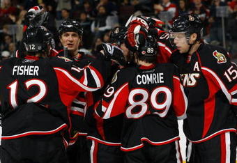 OTTAWA - MARCH 5:  Mike Fisher #12, Filip Kuba #17, Chris Campoli #14, Mike Comrie #89 and Dany Heatley #15 of the Ottawa Senators celebrate a goal against the Edmonton Oilers during a game on March 5, 2009 at the Scotiabank Place in Ottawa, Canada. (Photo by Phillip MacCallum/Getty Images)