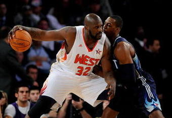 PHOENIX - FEBRUARY 15:  Shaquille O'Neal #32 of the Western Conference goes up against Dwight Howard #12 of the Eastern Conference during the 58th NBA All-Star Game, part of 2009 NBA All-Star Weekend at US Airways Center on February 15, 2009 in Phoenix, Arizona.  NOTE TO USER: User expressly acknowledges and agrees that, by downloading and or using this photograph, User is consenting to the terms and conditions of the Getty Images License Agreement.  (Photo by Kevork Djansezian/Getty Images)