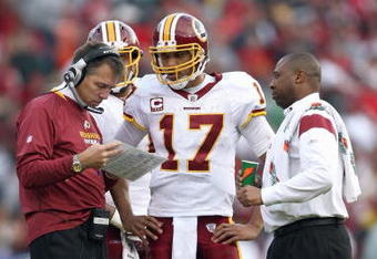 SAN FRANCISCO - DECEMBER 28:  Quarterback Jason Campbell #17 of the Washington Redskins listens to head coach Jim Zorn during the game against of the San Fransisco 49ers at Candlestick Park on December 28, 2008 in San Francisco, California. (Photo by: Jonathan Ferrey/Getty Images)