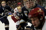 DENVER - APRIL 12:  The Notre Dame Fighting Irish and the Boston College Golden Eagles battle in the championship game at the 2008 NCAA Frozen Four Men's Ice Hockey National Championship at the Pepsi Center on April 12, 2008 in Denver, Colorado. Boston College defeated Notre Dame 4-1.  (Photo by Doug Pensinger/Getty Images)