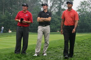 MEDINAH, IL - AUGUST 18:  Phil Mickelson, Geoff Ogilvy of Australia and Tiger Woods wait in the 15th fairway for the group ahead to finish on the 15th green during the second round of the 2006 PGA Championship at Medinah Country Club on August 18, 2006 in Medinah, Illinois.  (Photo by Jeff Gross/Getty Images)