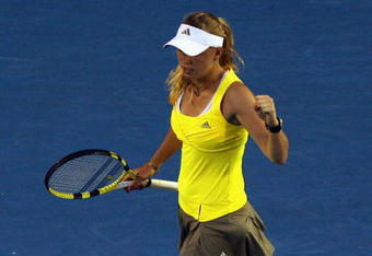 MELBOURNE, AUSTRALIA - JANUARY 23:  Caroline Wozniacki of Denmark celebrates winning the first set in her third round match against Jelena Dokic of Australia during day five of the 2009 Australian Open at Melbourne Park on January 23, 2009 in Melbourne, Australia.  (Photo by Robert Prezioso/Getty Images)