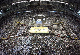 DETROIT - APRIL 06:  Tyler Hansbrough #50 of the North Carolina Tar Heels celebrates with his teammates as the Michigan State Spartans leave the court after losing to the Tar Heels 89-72 during the 2009 NCAA Division I Men's Basketball National Championship game at Ford Field on April 6, 2009 in Detroit, Michigan.  (Photo by Streeter Lecka/Getty Images)