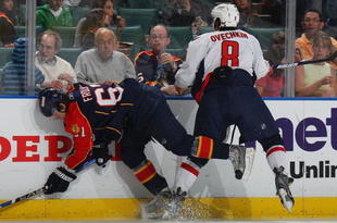 SUNRISE, FL - FEBRUARY 15: Alex Ovechkin #8 of the Washington Capitals hits Michael Frolik #67 of the Florida Panthers on February 15, 2009 at the BankAtlantic Center in Sunrise, Florida. (Photo by Bruce Bennett/Getty Images)