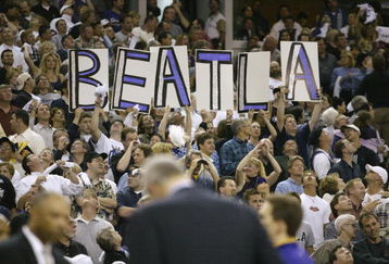 SACRAMENTO, CA - MAY 20:  Fans of the Sacramento Kings hold up signs in Game two of the Western Conference Finals against the Los Angeles Lakers during the 2002 NBA Playoffs at Arco Arena in Sacramento, California on May 20, 2002.  The Kings won 96-90.   NOTE TO USER: User expressly acknowledges and agrees that, by downloading and/or using this Photograph, User is consenting to the terms and conditions of the Getty Images License Agreement.  (Photo by Jed Jacobsohn/Getty Images) 