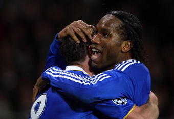 TURIN, ITALY - MARCH 10:  Didier Drogba of Chelsea celebrates scoring the second goal of the game for his team with Frank Lampard during the UEFA Champions League, First knock-out round, second leg match between Juventus and Chelsea at Stadio Olimpico di Torino on March 10, 2009 in Turin, Italy.  (Photo by Ryan Pierse/Getty Images)