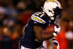 SAN DIEGO - DECEMBER 28:  Runningback LaDainian Tomlinson #21 of the San Diego Chargers carries the ball during the NFL game against the Denver Broncos at Qualcomm Stadium on December 28, 2008 in San Diego, California.  The Chargers defeated the Broncos 52--21.  (Photo by Jeff Gross/Getty Images)