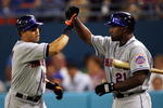 MIAMI - APRIL 18: Center fielder Carlos Beltran #15 of the New York Mets celebrates with Carlos Delgado #21after hitting a home run in the fourth inning against the Florida Marlins on April 18, 2006 at Dolphin Stadium in Miami, Florida. (Photo by Eliot J. Schechter/Getty Images)