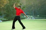 AUGUSTA, GA - APRIL 10:  Tiger Woods celebrates after sinking a putt on the first playoff hole to win the 2005 Masters on April 10, 2005 at Augusta National Golf Course in Augusta, Georgia.  (Photo By Getty Images)
