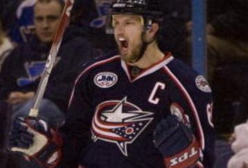 ST. LOUIS, MO. - MARCH 28: Rick Nash #61 of the Columbus Bluejackets celebrates his goal against the St. Louis Blues at the Scottrade Center on March 28, 2009 in St. Louis, Missouri.  The Blues won 4-3 in a shootout.  (Dilip Vishwanat/Getty Images)