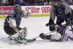 14 Apr 2001:  Goaltender Evgeni Nabokov #35 of the San Jose Sharks stops a shot while Keith Tkachuk #7 of the St.Louis Blues is cross checked by Marcus Ragnarsson #10 of the San Jose Sharks at the Savvis Center in St.Louis, Missouri.The San Jose Sharks beat the St.Louis Blues 1-0. DIGITAL IMAGE. Mandatory Credit: Elsa/ALLSPORT