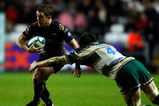 SWANSEA, UNITED KINGDOM - JANUARY 24:  Shane Williams of Ospreys is tackled by Martin Corry of Leicester Tigers during the Heineken Cup Match between Ospreys and Leicester Tigers at the Liberty Stadium on January 24, 2009 in Swansea, Wales.  (Photo by Stu Forster/Getty Images)