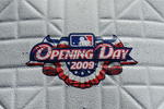 ARLINGTON, TX - APRIL 6:  The 'Opening Day 2009' logo is seen on a base before a game between the Cleveland Indians and the Texas Rangers during the home opener at Rangers Ballpark April 6, 2009 in Arlington, Texas.  (Photo by Ronald Martinez/Getty Images)