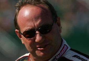 KANSAS CITY, KS - SEPTEMBER 28:  Ken Schrader, driver of the #21 Little Debbie Ford, watches during qualifying for the NASCAR Nextel Cup Series LifeLock 400 at Kansas Speedway on September 28, 2007 in Kansas City, Kansas.  (Photo by Todd Warshaw/Getty Images for NASCAR)