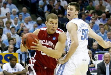 MEMPHIS, TN - MARCH 29:  Blake Griffin #23 of the Oklahoma Sooners drives to the basket by Tyler Hansbrough #50 of the North Carolina Tar Heels in the first half during the NCAA Men's Basketball Tournament South Regional Final at the FedExForum on March 29, 2009 in Memphis, Tennessee.  (Photo by Joe Murphy/Getty Images)