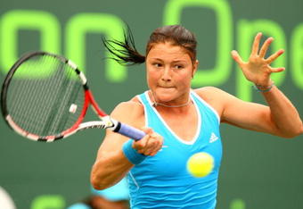 KEY BISCAYNE, FL - MARCH 27:  Dinara Safina of Russia returns a shot against Mathilde Johansson of France during day five of the Sony Ericsson Open at the Crandon Park Tennis Center on March 27, 2009 in Key Biscayne, Florida.  (Photo by Al Bello/Getty Images)