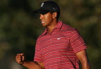 ORLANDO, FL - MARCH 29:  Tiger Woods celebrates a birdie putt on the 15th hole during the final round of the Arnold Palmer Invitational Presented by Mastercard at the Bay Hill Club and Lodge on March 29, 2009 in Orlando, Florida   (Photo by Doug Benc/Getty Images)