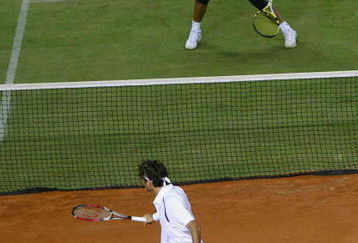 MALLORCA, SPAIN - MAY 2: Rafael Nadal of Spain in action against Roger Federer of Switzerland during 'The Battle of the Surfaces' at The Palma Arena on May 2, 2007 in Mallorca, Spain. (Photo by Clive Brunskill/Getty Images)