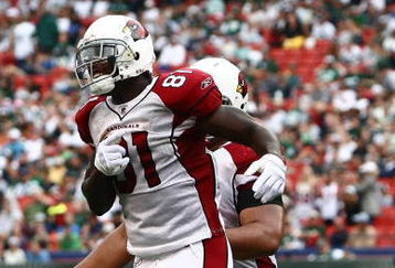 EAST RUTHERFORD, NJ - SEPTEMBER 28:  Anquan Boldin #81 of the Arizona Cardinals celebrates his touchdown against the New York Jets on September 28, 2008 at Giants Stadium in East Rutherford, New Jersey.  (Photo by Chris McGrath/Getty Images)