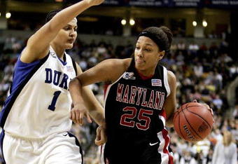 BOSTON - APRIL 04:  Marissa Coleman #25 of the Maryland Terrapins drives around Mistie Williams #1 of the Duke Blue Devils during the 2006 NCAA Women's Basketball Championship Game on April 4, 2006 at the TD Banknorth Garden in Boston, Massachusetts.  (Photo by Elsa/Getty Images)