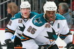 NEWARK, NJ - FEBRUARY 15:  Mike Grier #25 of the San Jose Sharks skates against the New Jersey Devils at the Prudential Center on February 15, 2009 in Newark, New Jersey. The Devils defeated the Sharks 6-5.  (Photo by Jim McIsaac/Getty Images)