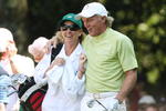 AUGUSTA, GA - APRIL 08:  Greg Norman of Australia celebrates his hole-in-one on the sixth hole with his wife/caddie Chris Evert during the Par 3 Contest prior to the 2009 Masters Tournament at Augusta National Golf Club on April 8, 2009 in Augusta, Georgia.  (Photo by David Cannon/Getty Images)