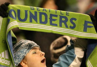 SEATTLE - MARCH 28:  A fan of Seattle Sounders FC shows her support during the MLS match between Real Salt Lake and the Seattle Sounders on March 28, 2009 at Qwest Field in Seattle, Washington. The Sounders defeated RSL 2-0. (Photo by Otto Greule Jr/Getty Images)