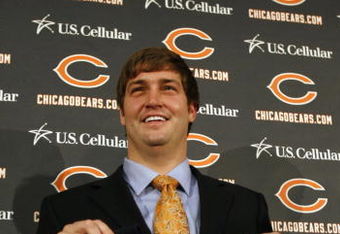 LAKE FOREST, IL - APRIL 3: Quarterback Jay Cutler of the Chicago Bears holds up his #6 jersey after he was introduced as their new quarterback during a press conference on April 3, 2009 at Halas Hall in Lake Forest, Illinois. (Photo by Jim Prisching/Getty Images)