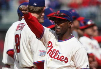 PHILADELPHIA - APRIL 08:  Jimmy Rollins #11 of the Philadelphia Phillies shows of his World Series ring during a ceremony prior to the game against the Atlanta Braves at Citizens Bank Park on April 8, 2009 in Philadelphia, Pennsylvania.  (Photo by Nick Laham/Getty Images)