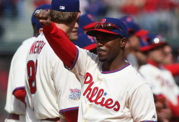 PHILADELPHIA - APRIL 08:  Jimmy Rollins #11 of the Philadelphia Phillies shows of his World Series ring during a ceremony prior to the game against the Atlanta Braves at Citizens Bank Park on April 8, 2009 in Philadelphia, Pennsylvania.  (Photo by Nick Laham/Getty Images)