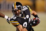 PITTSBURGH - DECEMBER 7:  Hines Ward #86 of the Pittsburgh Steelers runs with the ball during their NFL game against the Dallas Cowboys on December 7, 2008 at Heinz Field in Pittsburgh, Pennsylvania. The Steelers defeated the Cowboys 20-13. (Photo by Gregory Shamus/Getty Images)