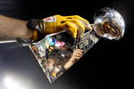 TAMPA, FL - FEBRUARY 01:  Players from the Pittsburgh Steelers celebrate with the Vince Lombardi trophy after their 27-23 win against the Arizona Cardinals during Super Bowl XLIII on February 1, 2009 at Raymond James Stadium in Tampa, Florida.  (Photo by Jamie Squire/Getty Images)