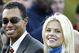 SUTTON COLDFIELD - SEPTEMBER 26: Golfer Tiger Woods poses with girlfriend Elin Nordegren during the opening Ceremony for the 34th Ryder Cup on September 26, 2002 in Sutton Coldfield, England. (Photo by Andrew Redington/Getty Images)