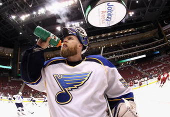 GLENDALE, AZ - APRIL 07:  Goaltender Chris Mason #50 of the St. Louis Blues pauses during warm ups before a NHL game against the Phoenix Coyotes at Jobing.com Arena on April 7, 2009 in Glendale, Arizona.  (Photo by Christian Petersen/Getty Images)