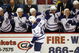 DETROIT - OCTOBER 9:  Nikolai Kulemin #41 of the Toronto Maple Leafs skates by the Leafs bench to celebrate with teammates during their game against the Detroit Red Wings on October 9, 2008 at Joe Louis Arena in Detroit, Michigan. The Leafs defeated the Wings 3-2. (Photo by Gregory Shamus/Getty Images)