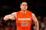 NEW YORK - MARCH 14:  Eric Devendorf #23 of the Syracuse Orange reacts between plays against the Louisville Cardinals during the championship game of the Big East Tournament at Madison Square Garden on March 14, 2009 in New York City.  (Photo by Jim McIsaac/Getty Images)