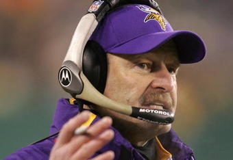 GREEN BAY, WI - DECEMBER 21:  Head coach Brad Childress of the Minnesota Vikings questions a call be the referee during a game against the Green Bay Packers on December 21, 2006 at Lambeau Field in Green Bay, Wisconsin. The Packers defeated the Vikings 9-7. (Photo by Jonathan Daniel/Getty Images)