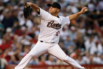 HOUSTON - APRIL 07:  Pitcher Wandy Rodriguez #51 of the Houston Astros delivers to the plate against the St. Louis Cardinals on April 7, 2008 at Minute Maid Park in Houston, Texas.  (Photo by Bob Levey/Getty Images)