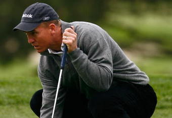 PEBBLE BEACH, CA - FEBRUARY 12:  Peyton Manning lines up a putt on the sixth green during the first round of the AT&T Pebble Beach National Pro-Am at the Spyglass Hill Golf Course on February 12, 2009 in Pebble Beach, California.  (Photo by Jeff Gross/Getty Images)