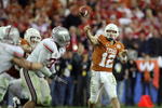 GLENDALE, AZ - JANUARY 05:  Quarterback Colt McCoy #12 of the Texas Longhorns throws a pass against the Ohio State Buckeyes during the Tostitos Fiesta Bowl Game on January 5, 2009 at University of Phoenix Stadium in Glendale, Arizona.   The Longhorns defeated the Buckeyes 24-21.  (Photo by Jed Jacobsohn/Getty Images)