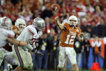 GLENDALE, AZ - JANUARY 05:  Quarterback Colt McCoy #12 of the Texas Longhorns throws a pass against the Ohio State Buckeyes during the Tostitos Fiesta Bowl Game on January 5, 2009 at University of Phoenix Stadium in Glendale, Arizona.   The Longhorns defeated the Buckeyes 24-21.  (Photo by Jed Jacobsohn/Getty Images)