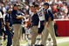 FOXBORO, MA - SEPTEMBER 7: Quarterback Tom Brady #12 of the New England Patriots walks off the field with the aid of the Patriots staff after being injured on a play during their NFL game against the Kansas City Chiefs on September 7, 2008 at Gillette Stadium in Foxboro, Massachusetts. The Patriots defeated the Chiefs 17-10. (Photo by Elsa Garrison/Getty Images)