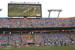 MIAMI, FL - JANUARY 4:  A large scoreboard shows play as the Miami Dolphins host the Baltimore Ravens in an NFL Wildcard Playoff Game at Dolphins Stadium on January 4, 2009 in Miami, Florida.  (Photo by Al Messerschmidt/Getty Images)