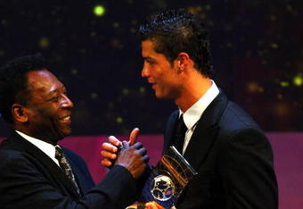 ZURICH, SWITZERLAND - JANUARY 12: Pele congratulates Cristiano Ronaldo of Portugal as he wins The FIFA World Player Of The Year 2008, at the Zurich Opera House on January 12, 2009 in Zurich, Switzerland.  (Photo by John Gichigi/Getty Images)