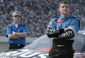 5 APR 2002:   Casey Atwood waits to qualify in his #7 Ultra Motorsports Dodge Intrepid R\\T for the NASCAR Winston Cup Series Samsung\\Radio Shack 500 at Texas Motor Speedway in Fort Worth, Texas. DIGITAL IMAGE - Mandatory Credit: Jon Ferrey/Getty Images